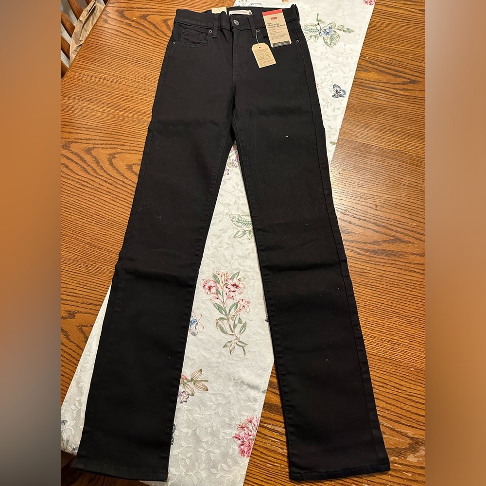 724 high rise black Levi’s